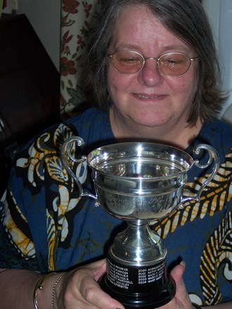 With the Ellis Trophy, August 04