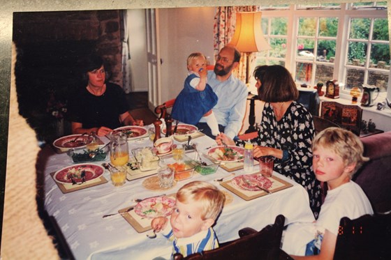 At the Anstee house for Sunday roast, 1996 (Dave holding my daughter Ingrid, 1; our sons Erik and Edward in the foreground)