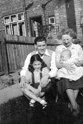 Walter Sr, Marjorie, Ilaine and baby Walter in 1952