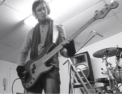 Ian Leaf displays shrewd use of fingerless gloves, whilst recording bass for My Attorney&#39;s Panama.