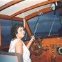 Barbara Ann driving the boat named after her (the Barbara Ann)