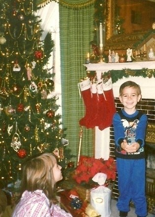 William with his sister Natalie looking on - Christmas at home in Danville - 1995