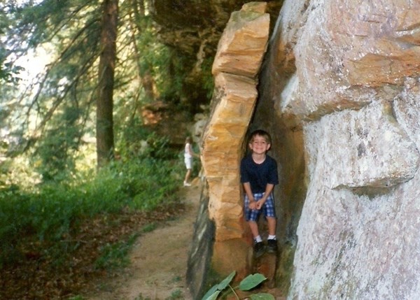  William plays hide and seek on a path at Turkey Run State Park, Indiana
