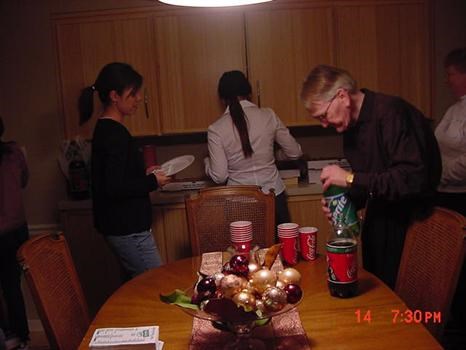 Tom McRoberts serving UMM Int&#39;l Students during a Christmas Holiday Party in 02&#39;