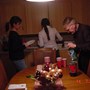 Tom McRoberts serving UMM Int'l Students during a Christmas Holiday Party in 02'