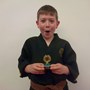 Ollie Gardiner receiving Student of the Month at Tring Martial Arts Academy