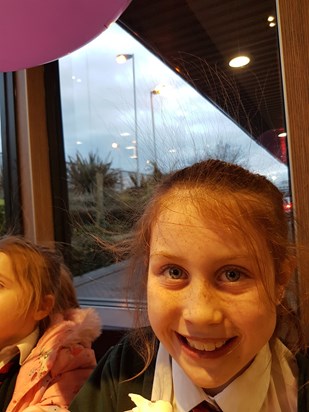 One of our many McDonald's trips! Hair raising with balloon static! Fun times. X