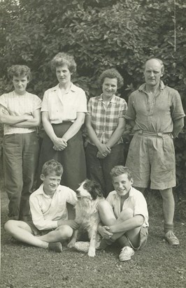 With parents & siblings 1955