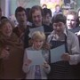 Screenshot of Lena singing a carol on the 1981 Pebble Mill Christmas show.