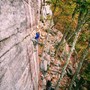 Emily Shertzer with Marco climbing Never Never Land in the Gunks. 